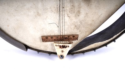 Lot 61 - A seven-string banjo