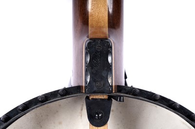 Lot 61 - A seven-string banjo
