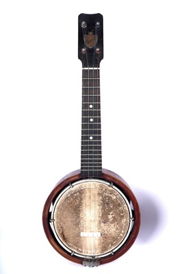 Lot 66 - Two ukulele banjos; and a mandolin banjo