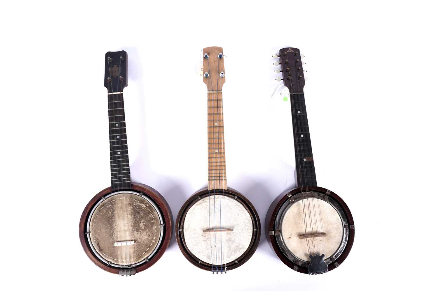 Lot 66 - Two ukulele banjos; and a mandolin banjo