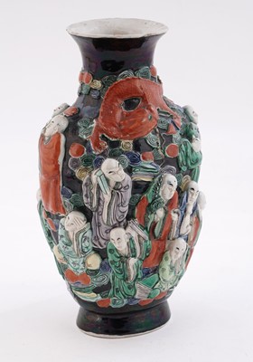 Lot 319 - A Chinese famille noir biscuit vase