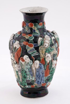 Lot 319 - A Chinese famille noir biscuit vase