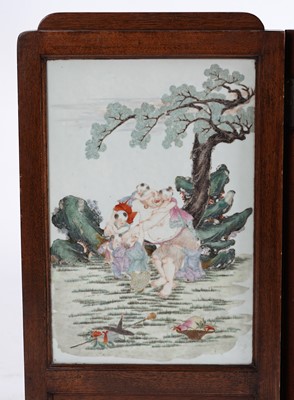 Lot 320 - A Chinese porcelain two-fold screen