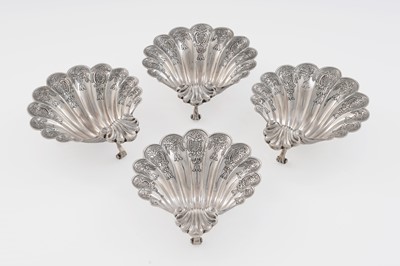 Lot 14 - A set of four George V silver butter shells