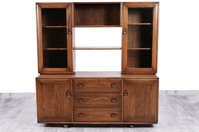 Lot 78 - Ercol: an elm ‘Windsor’ display cabinet