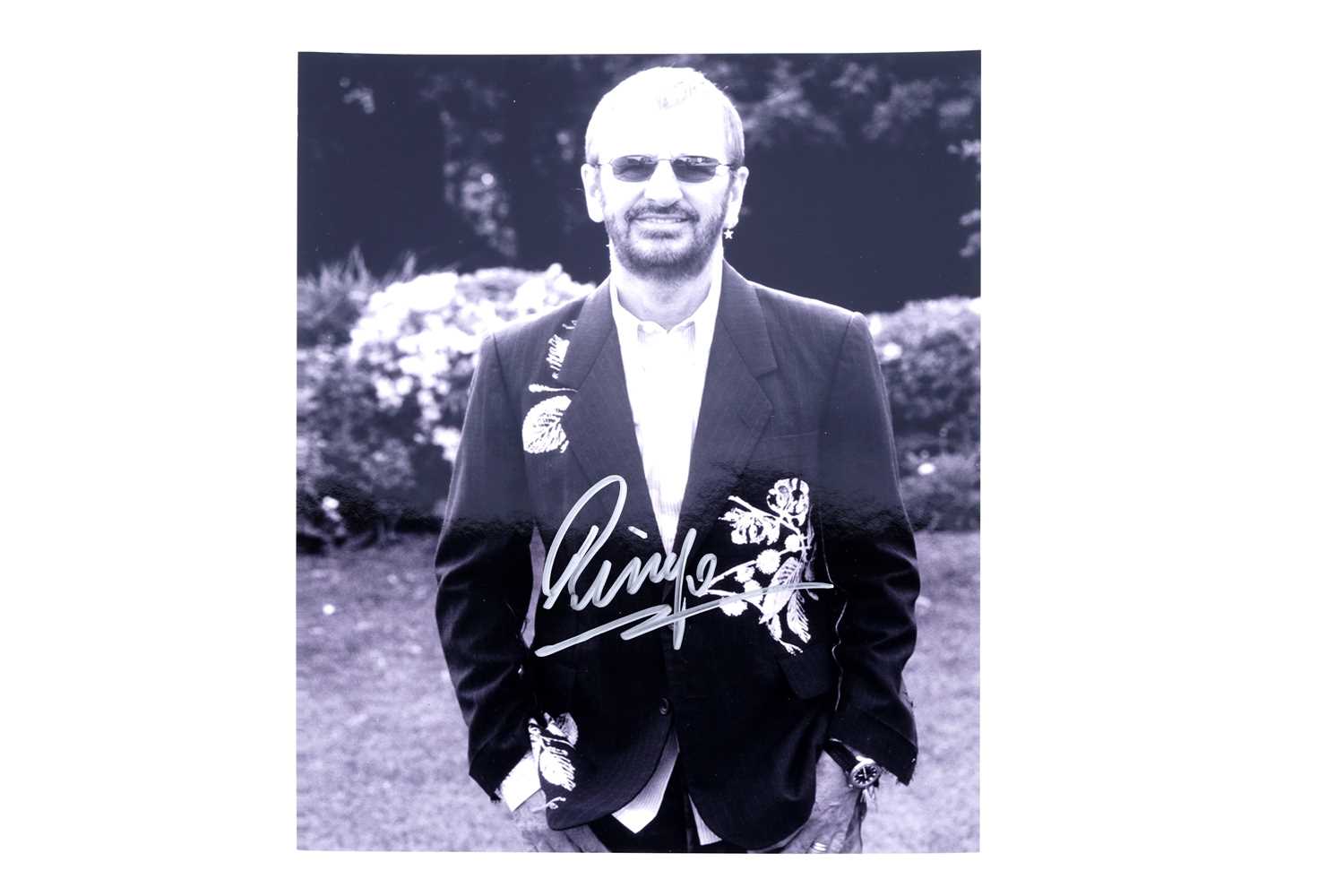 Lot 213 - The Beatles: Ringo Starr autographed photograph