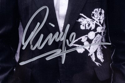 Lot 213 - The Beatles: Ringo Starr autographed photograph