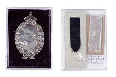 Lot 834 - A German First World War Military Pilot's badge and miniature medal