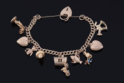 Lot 106 - A 9ct gold fancy curb-link charm bracelet