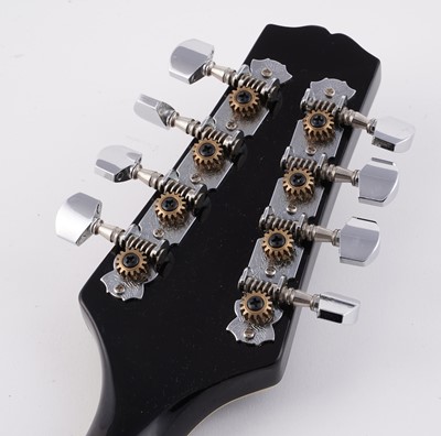 Lot 69 - A Bouzouki; and two mandolins