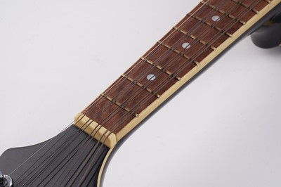 Lot 69 - A Bouzouki; and two mandolins