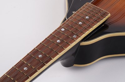 Lot 69 - A Bouzouki; and two mandolins