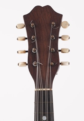 Lot 69 - A Bouzouki; and two mandolins