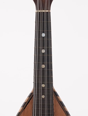 Lot 69 - A Bouzouki; and two mandolins