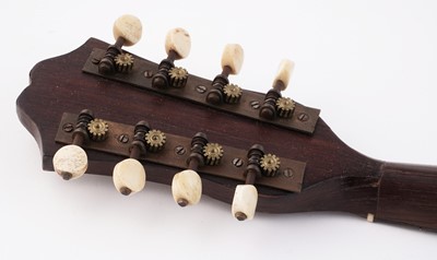 Lot 69 - A Bouzouki; and two mandolins