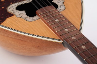 Lot 69 - A Bouzouki; and two mandolins
