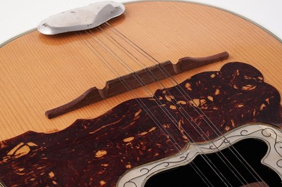 Lot 69 - A Bouzouki; and two mandolins