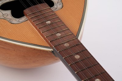 Lot 69 - A Bouzouki; and two mandolins