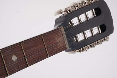 Lot 69 - A Bouzouki; and two mandolins