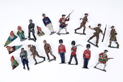 Lot 293 - A collection of hand painted lead soldiers; and a selection of painted gnomes