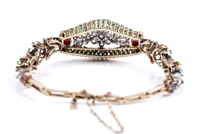 Lot 921 - An emerald, ruby and diamond bracelet