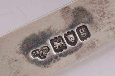 Lot 168 - An Edwardian arts and crafts silver toast rack