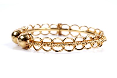 Lot 853 - A high carat yellow gold bangle