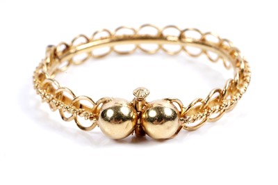 Lot 853 - A high carat yellow gold bangle