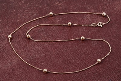Lot 142 - A modern 9ct gold box-link and bauble necklace