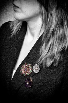 Lot 945 - A ruby, sapphire and emerald brooch