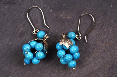 Lot 541 - A pair of turquoise set bunch of grapes pattern earrings