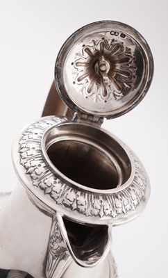 Lot 227 - A George V silver four-piece tea service