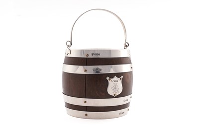 Lot 137 - A late Victorian silver mounted wooden biscuit barrel
