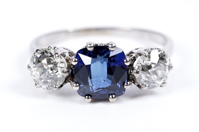 Lot 947 - A Burmese sapphire and diamond ring