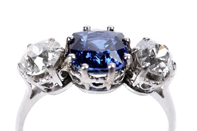 Lot 947 - A Burmese sapphire and diamond ring