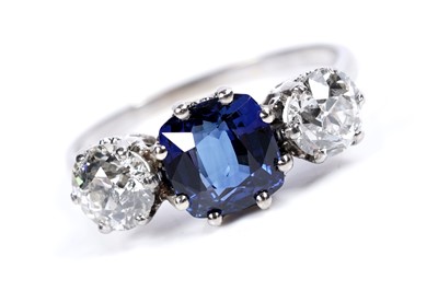 Lot 947 - A Burmese sapphire and diamond ring
