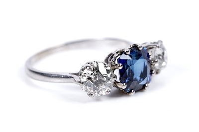 Lot 947 - A Burmese sapphire and diamond ring