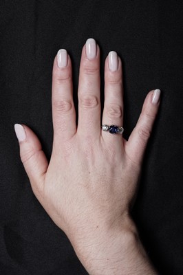 Lot 947 - A Burmese sapphire and diamond ring