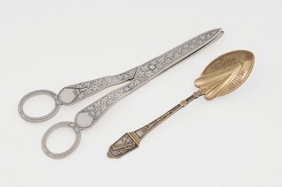 Lot 275 - A pair of Victorian silver grape scissor; and a Victorian silver and parcel-gilt spoon