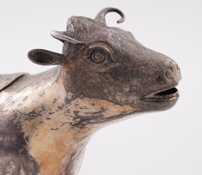 Lot 156 - A George II silver-gilt cow cream jug