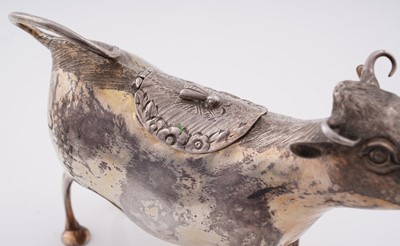 Lot 156 - A George II silver-gilt cow cream jug