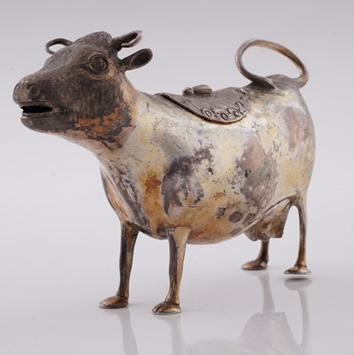 Lot 156 - A George II silver-gilt cow cream jug
