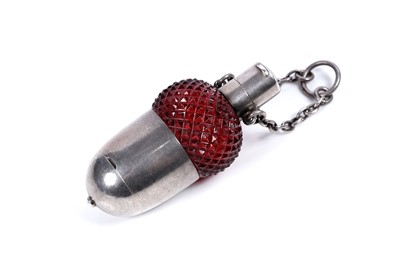 Lot 604 - A rare Victorian novelty silver mounted cranberry glass vinaigrette and combined scent bottle