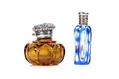 Lot 727 - A small, late Victorian silver mounted amber glass vinaigrette; and a small glass scent bottle