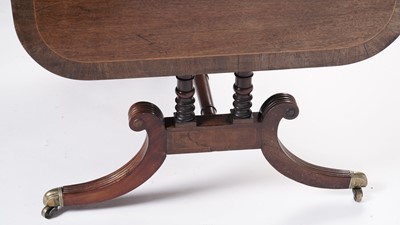 Lot 12 - A Regency inlaid mahogany and walnut banded sofa table