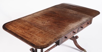 Lot 12 - A Regency inlaid mahogany and walnut banded sofa table