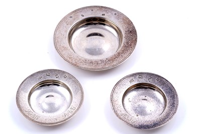 Lot 286 - Three Elizabeth II silver Armada dishes