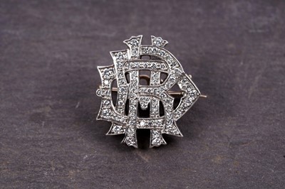 Lot 980 - An early 20th Century monogram diamond brooch