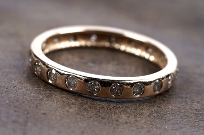 Lot 89 - A contemporary diamond eternity ring