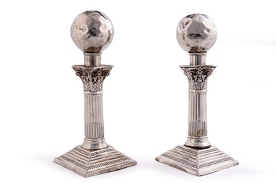Lot 514 - A pair of trophies constructed from silver Corinthian pattern columnar candlesticks